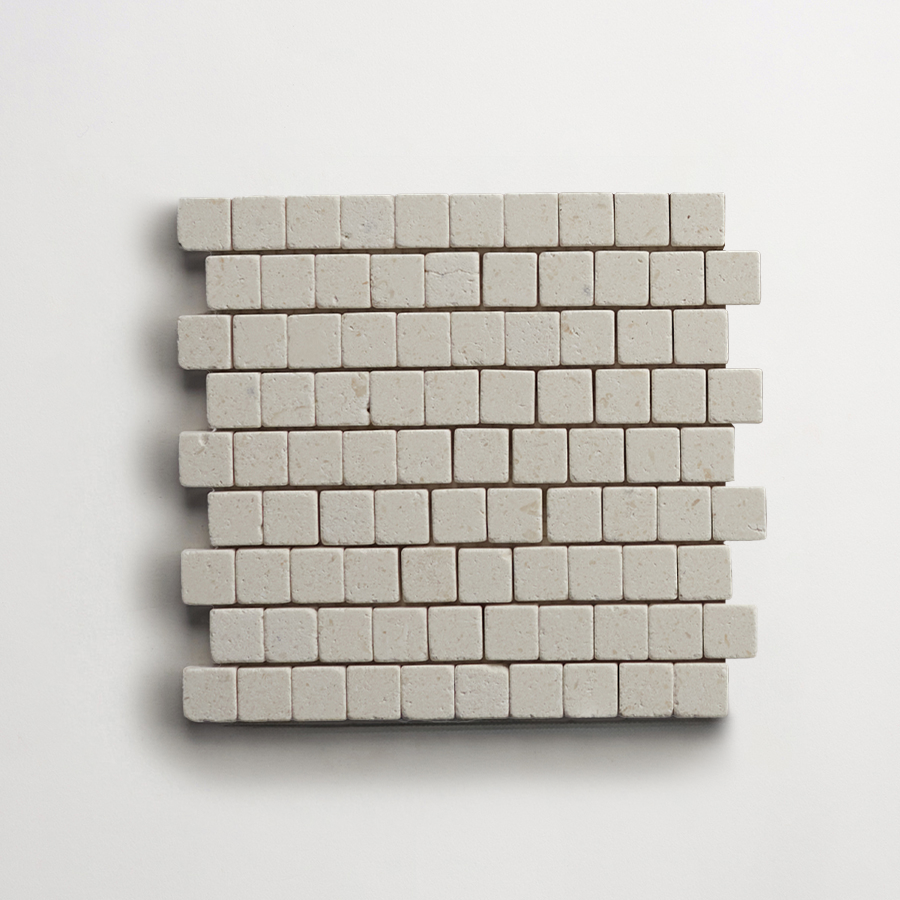 clé lapidary: micro-mosaics | confetti | tumbled | white limestone | sample ~ ⅝"x⅝"x⅜"