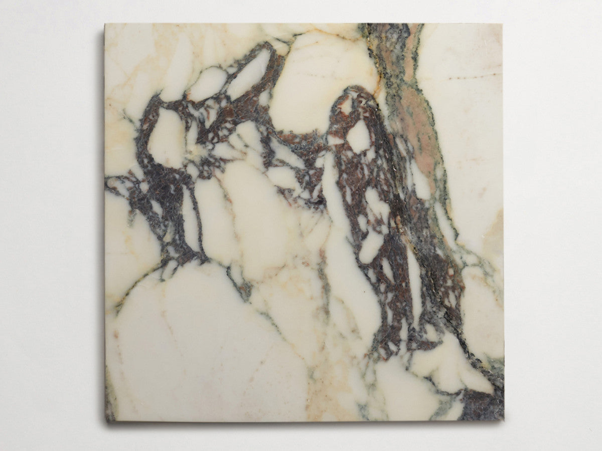 Lapidary stone tile 24 in. square Calacatta White Honed.