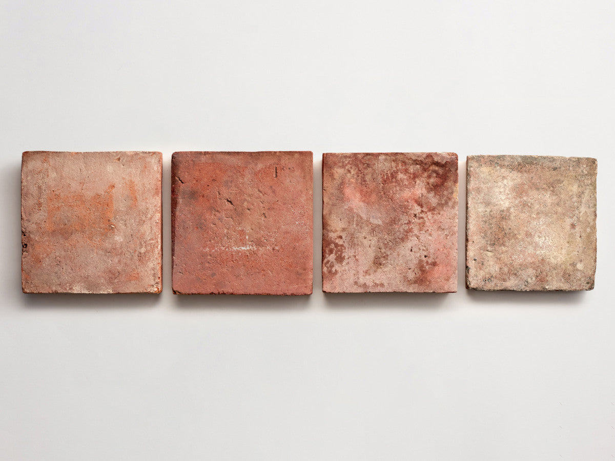 Antique terracotta provincial red square tile.