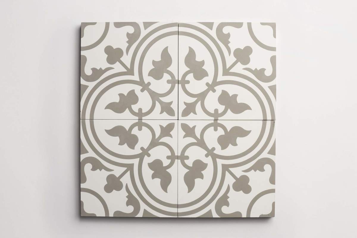 Tile concrete cement four leaf clover metal grey on white.