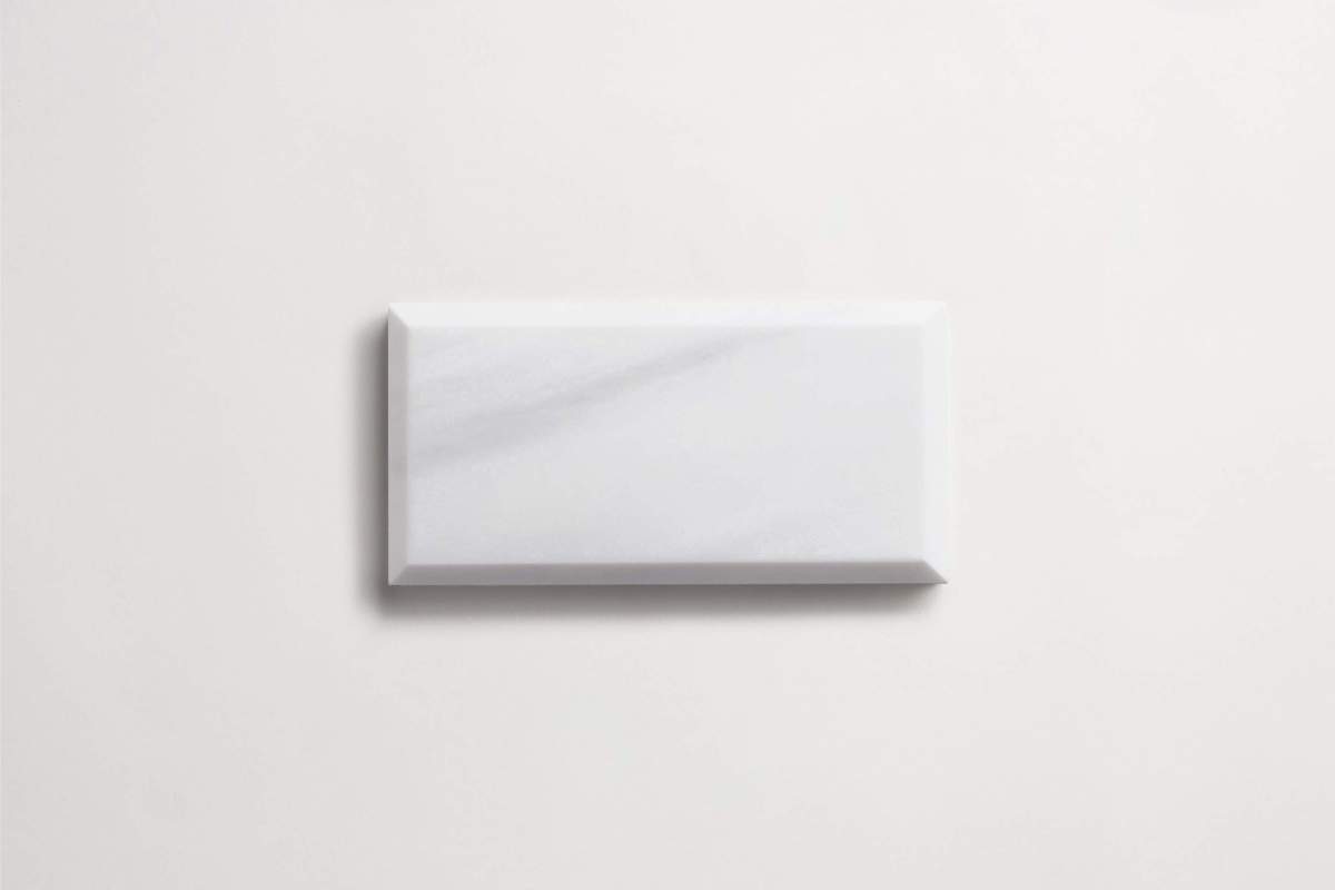 Tile bianco dolomite white stone beveled subway.