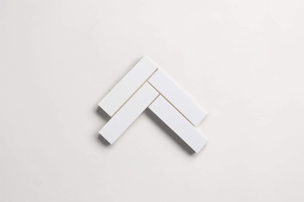 Tile thassos white stone herringbone sheet.