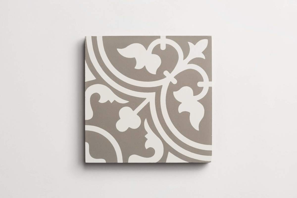 Tile concrete cement four leaf clover white on grey.