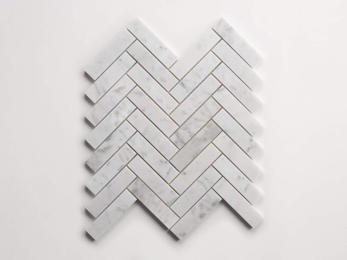 Tile carrara marble white stone herringbone mosaic.