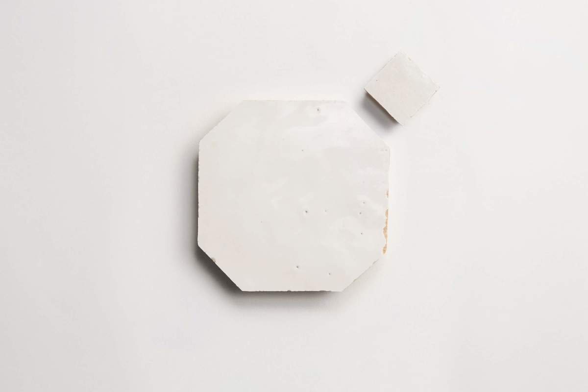 Weathered white octagon & bouchon zio & sons tile.