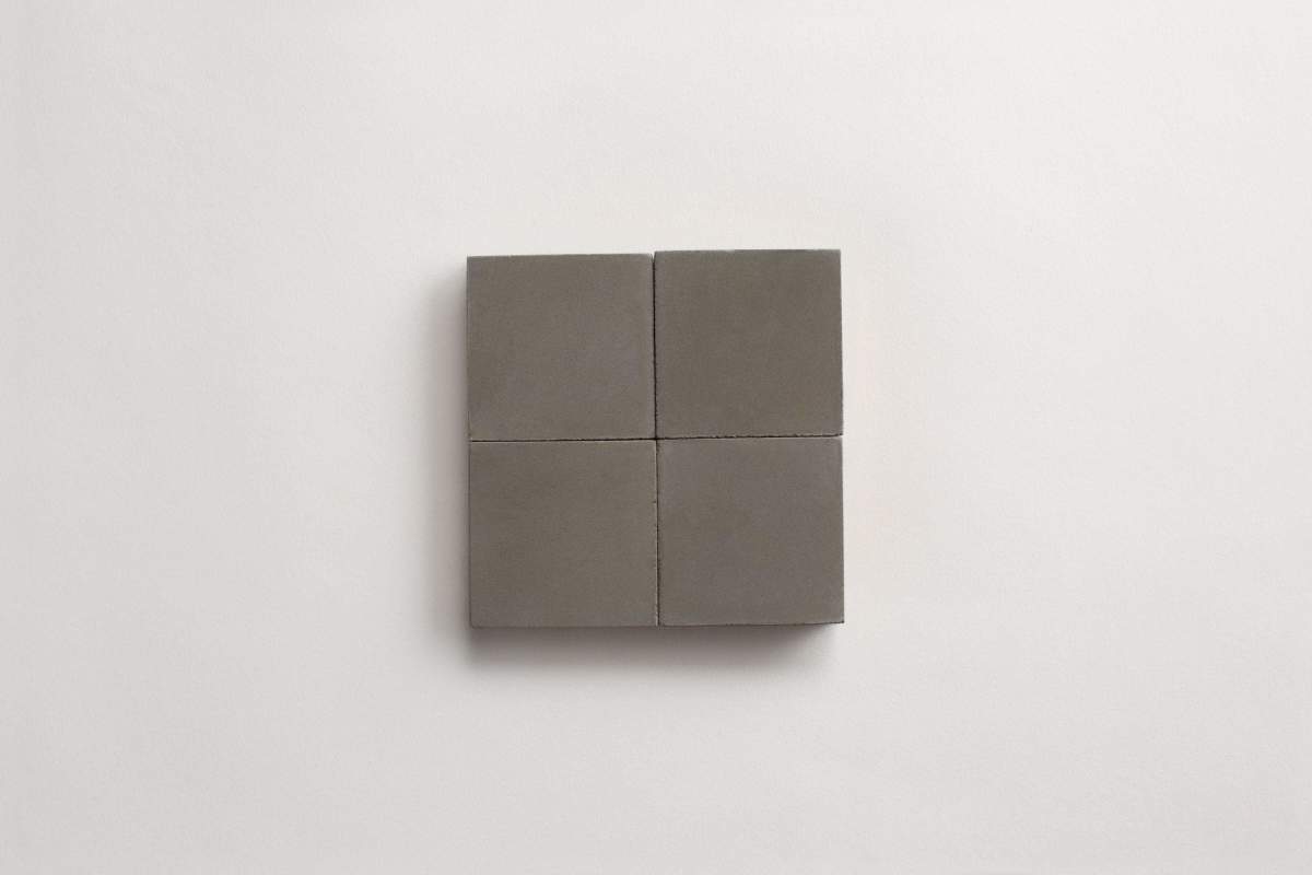 If you're not sure about committing to a specific tile color yet, you can certainly sample a solid square, metal colored cement tile from tile!