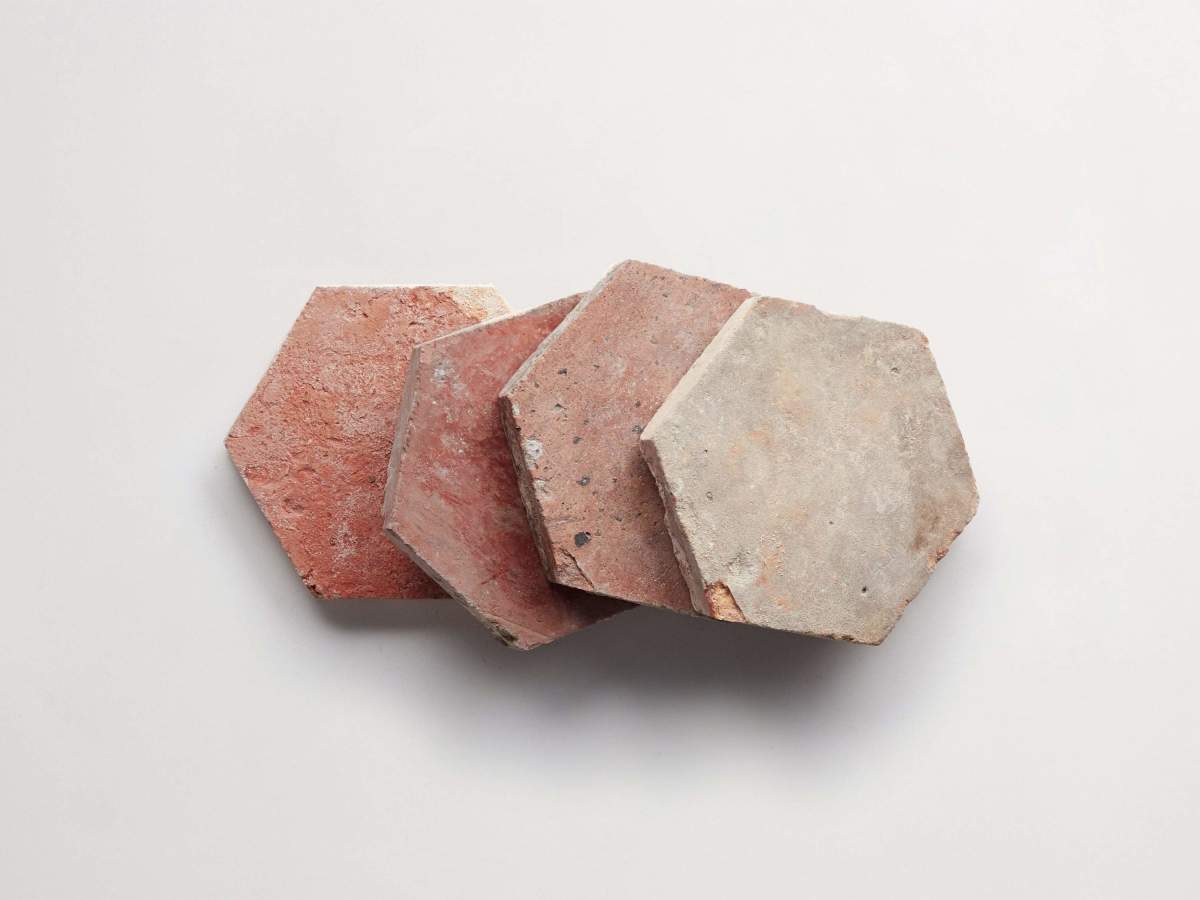 Antique terracotta provincial red hex tile.