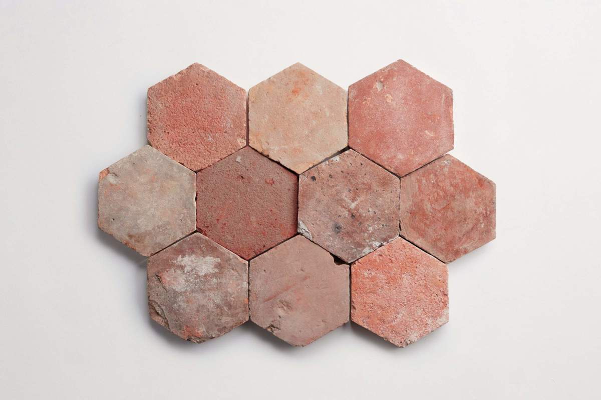 Antique terracotta provincial red hex tile.