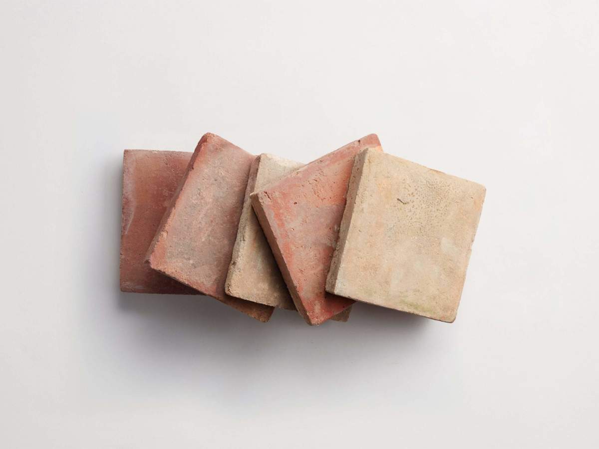 Antique terracotta provincial red square tile.