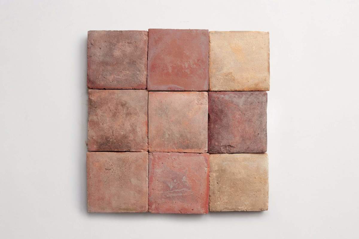 Antique terracotta provincial red square tile.