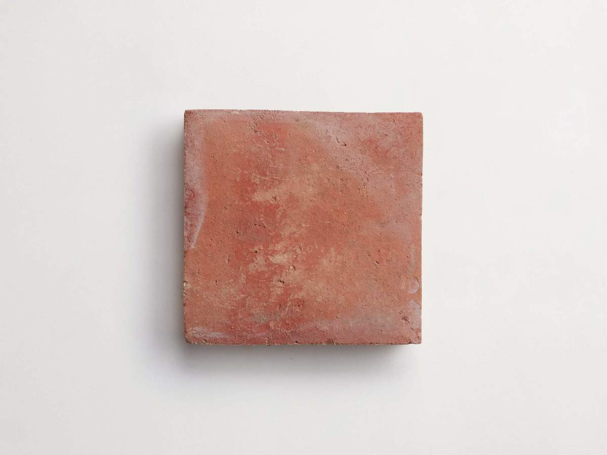 Antique terracotta provincial red square tile.