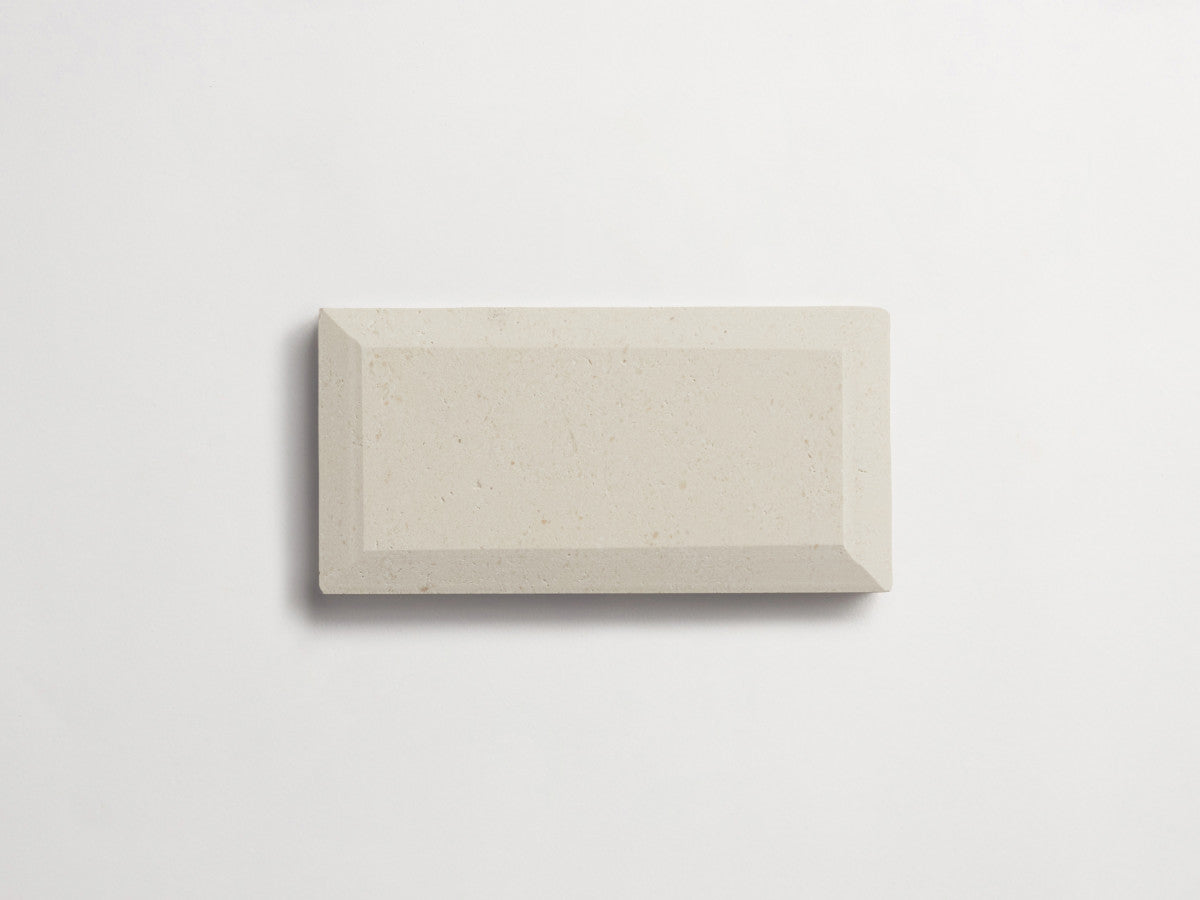 clé lapidary: banchina | beveled subway | honed | white limestone ~ 3"x6"x⅜"