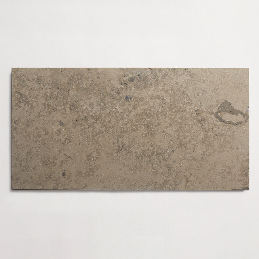 Lapidary limestone tile 24 x 12 Chantilly Grey Honed.