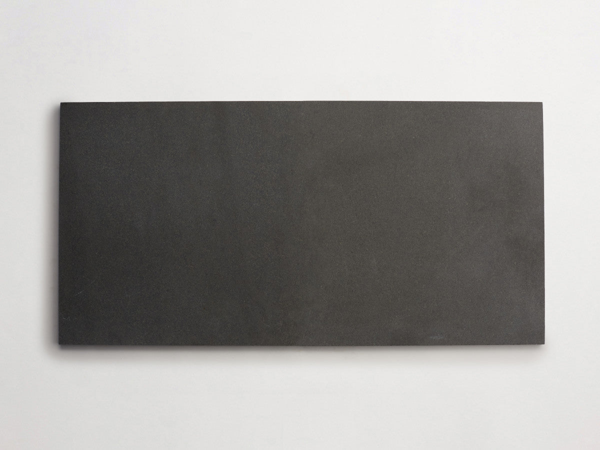 Lapidary stone tile 24 x 12 Warm Black Honed.