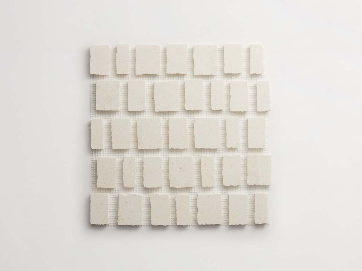 White mosaic tile limestone wide grout lapidary.