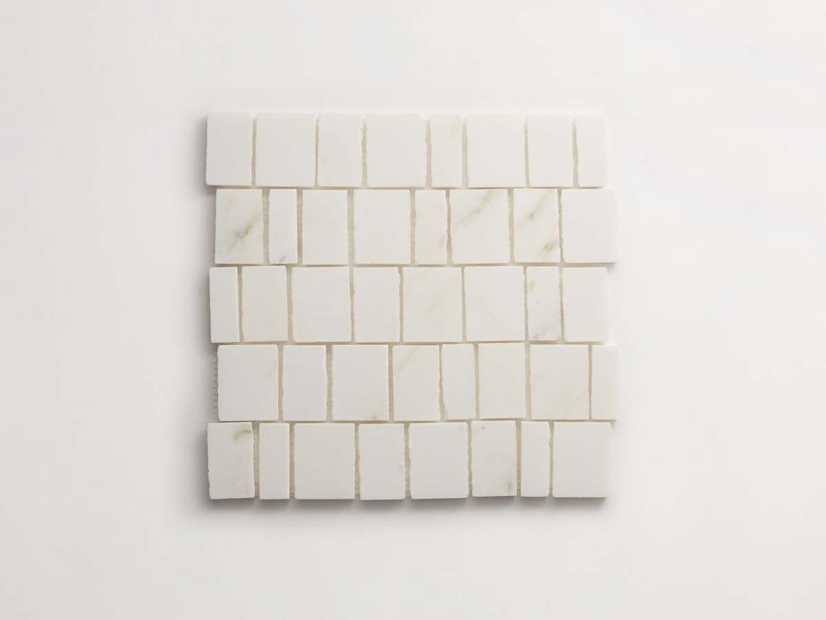 Calacatta gold mosaic tile rough cut lapidary.
