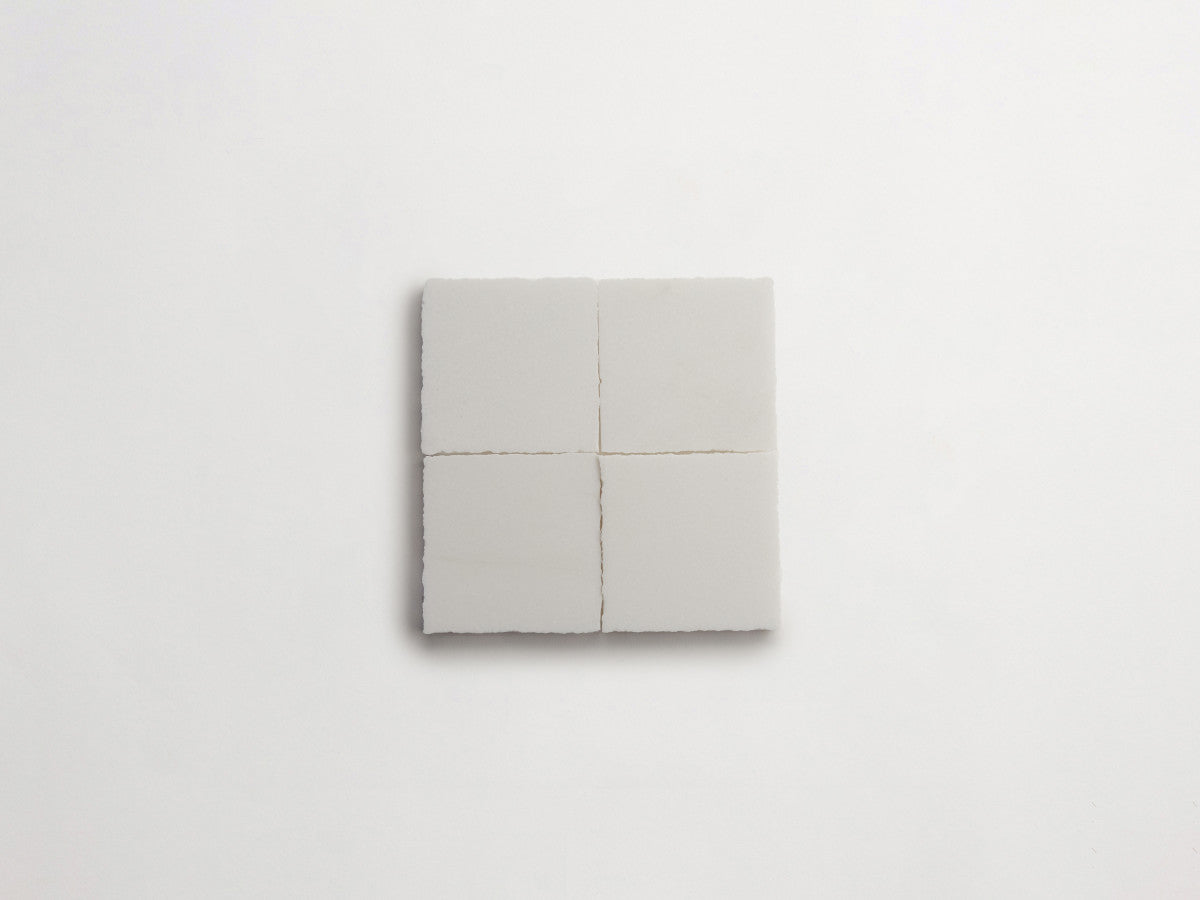 Lapidary stone tile 4 in. square Thassos White Honed.