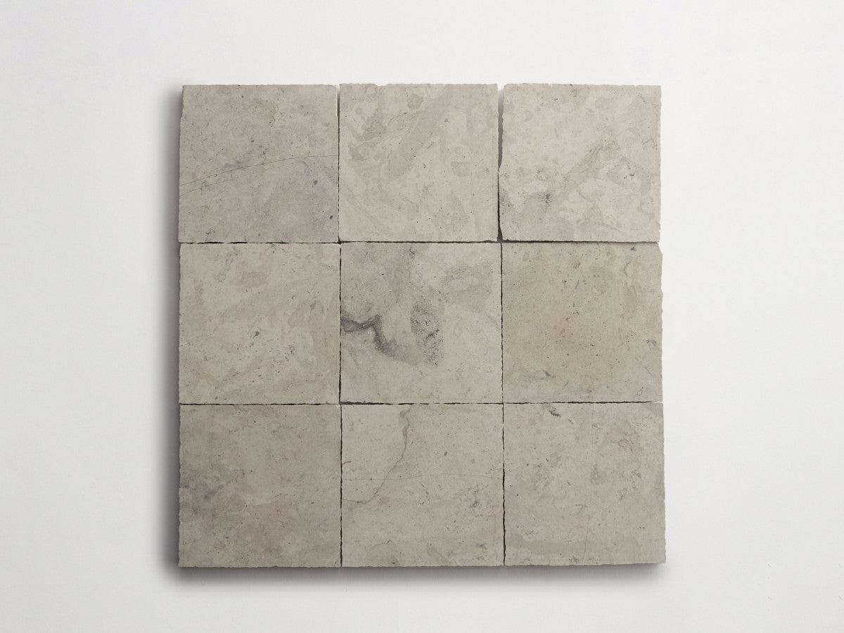 Lapidary stone tile 4 in. square Alpaca Grey Honed.