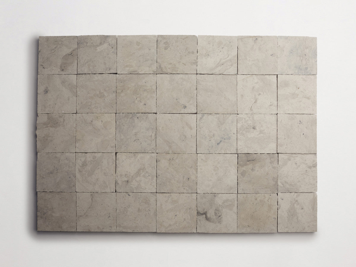 Lapidary stone tile 4 in. square Alpaca Grey Honed.