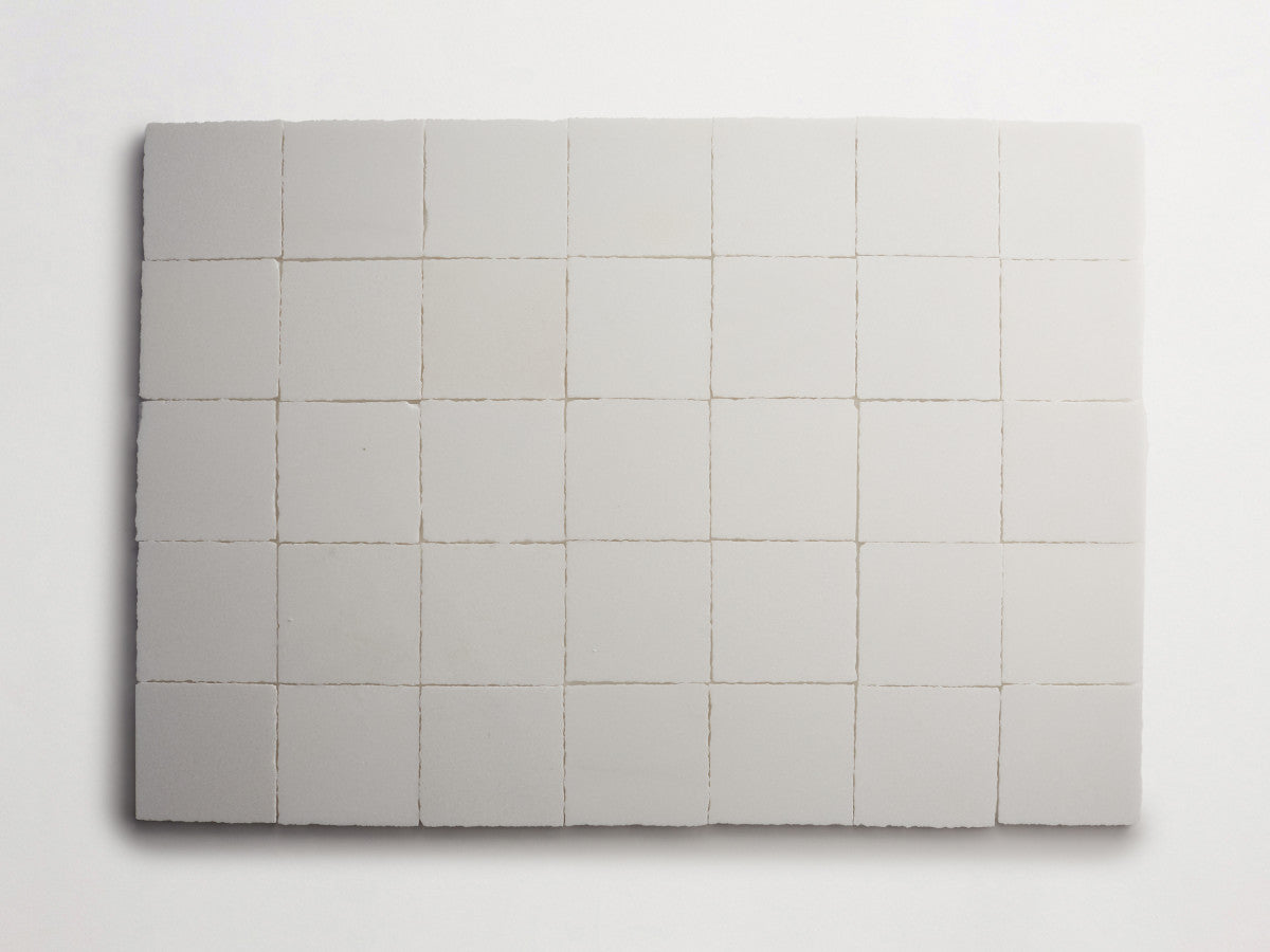 Lapidary stone tile 4 in. square Thassos White Honed.