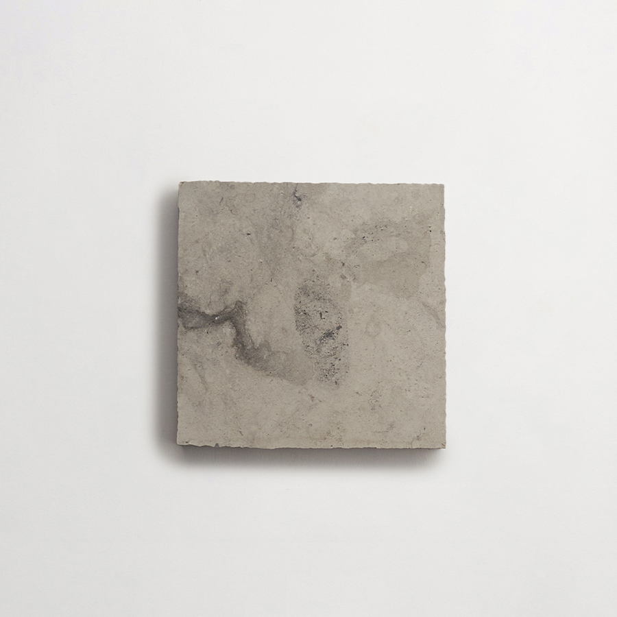 Lapidary stone tile 4 in. square Alpaca Grey Honed.