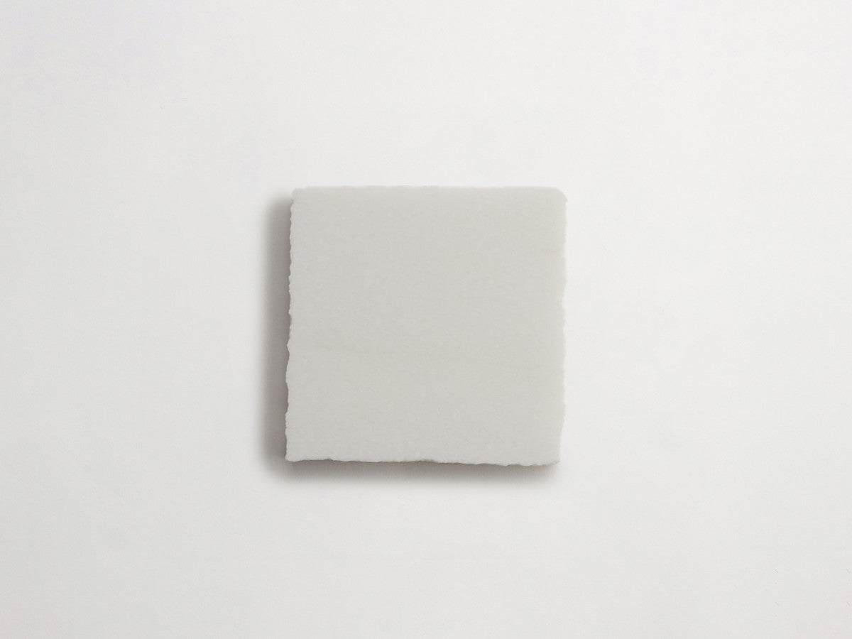 Lapidary stone tile 4 in. square Thassos White Honed.