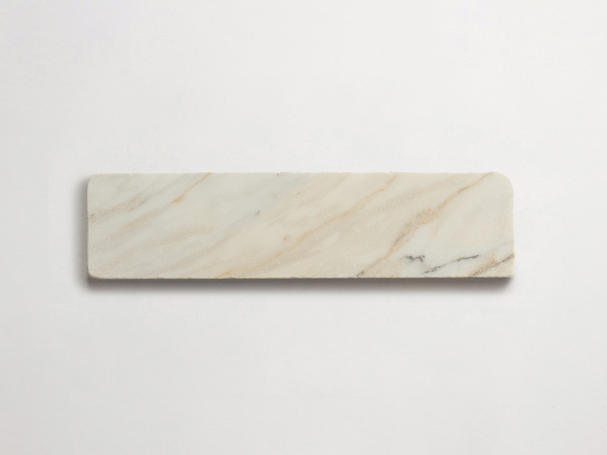 Lapidary stone tile 12 x 3 Calacatta Gold Tumbled.