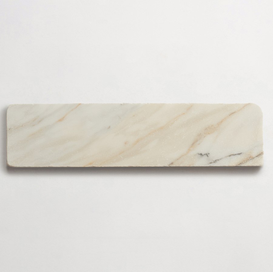 Lapidary stone tile 12 x 3 Calacatta Gold Tumbled.