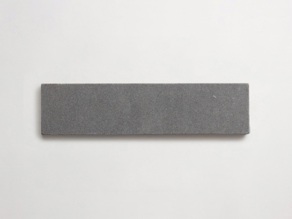 Lapidary stone tile 12 x 3 Warm Black Tumbled.