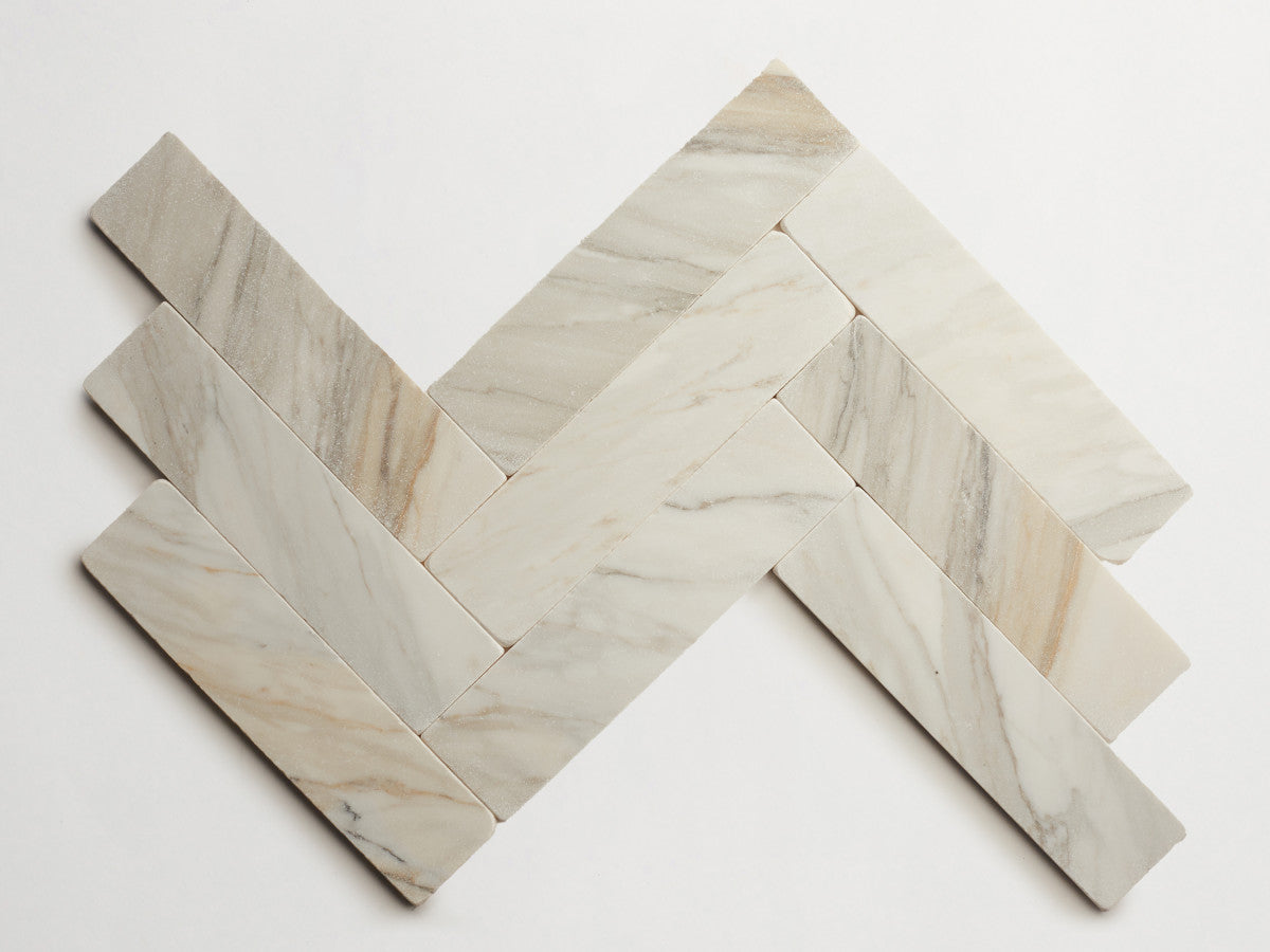 Lapidary stone tile 12 x 3 Calacatta Gold Tumbled.