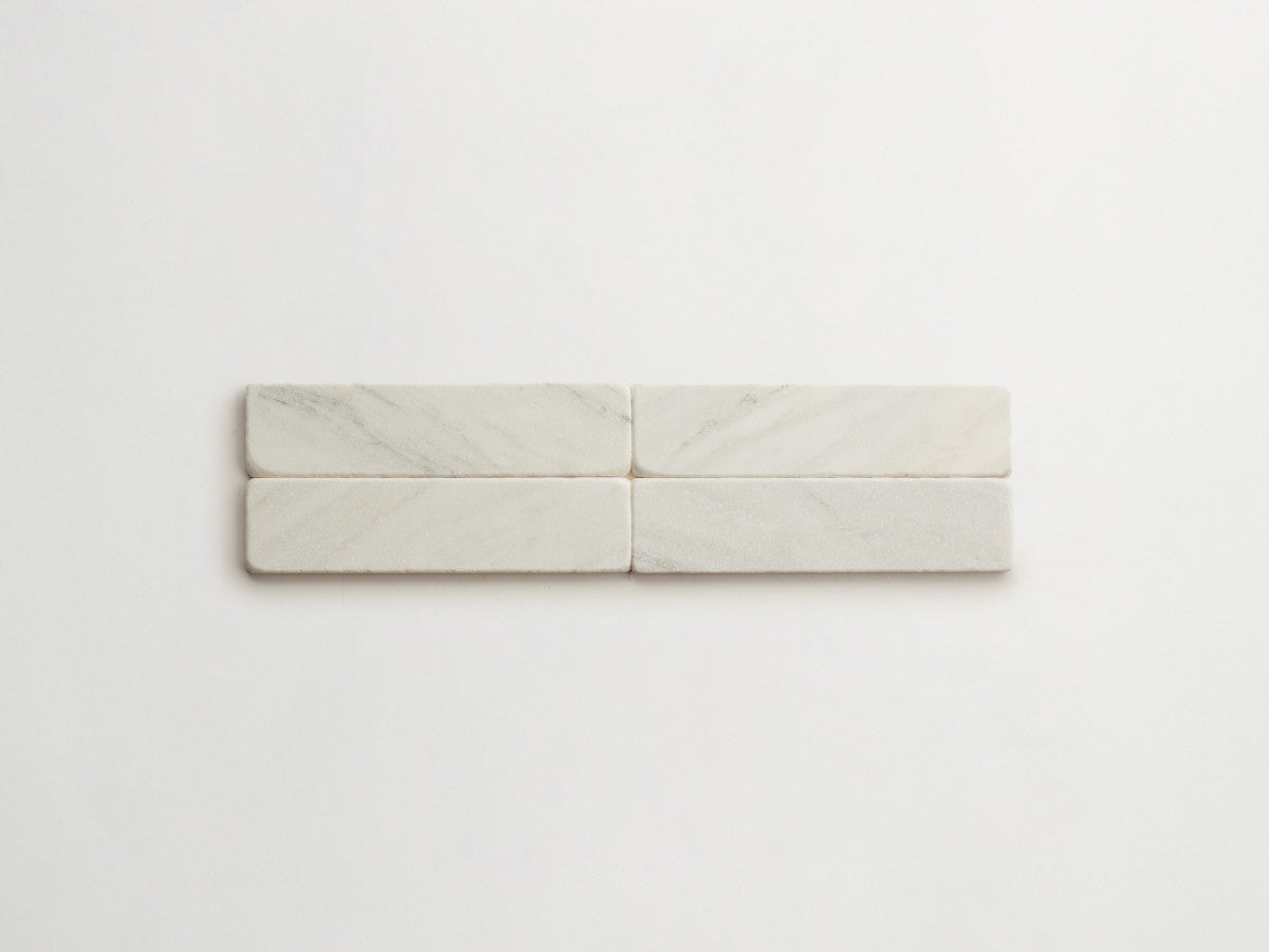 Lapidary stone tile 8 x 2 Calacatta Gold Tumbled.