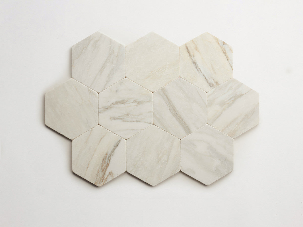 Lapidary stone tile 6¾ in. hex Calacatta Gold Tumbled.