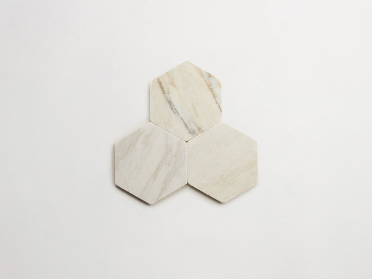 Lapidary stone tile 6¾ in. hex Calacatta Gold Tumbled.