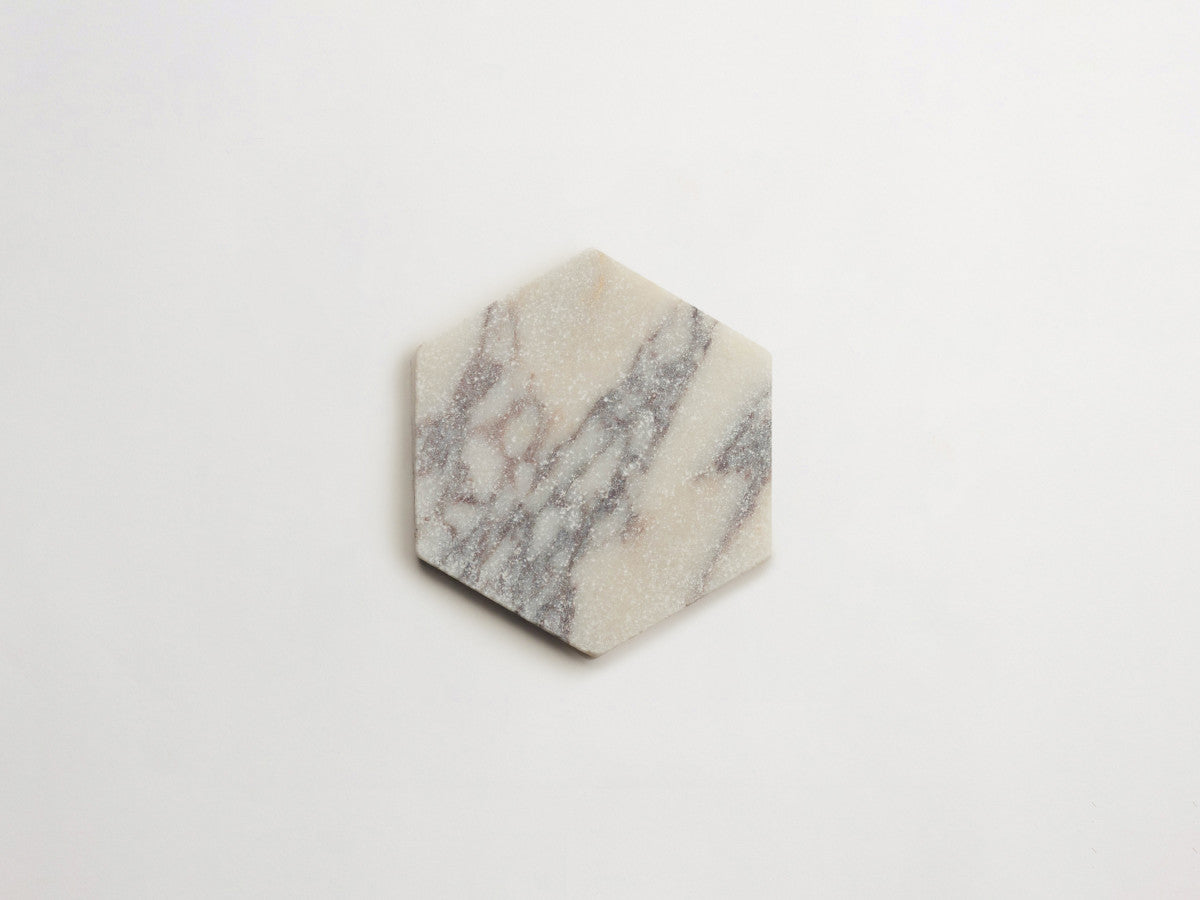 Lapidary stone tile 6¾ in. hex Calacatta White Tumbled.