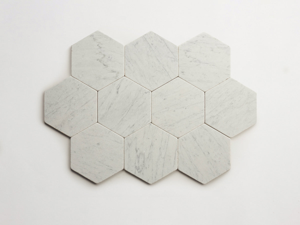Lapidary stone tile 6¾ in. hex Carrara White Tumbled.