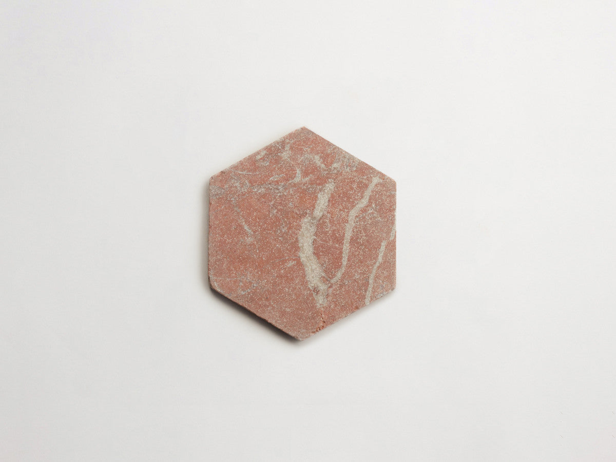 Lapidary stone tile 6¾ in. hex Alicante Red Tumbled.