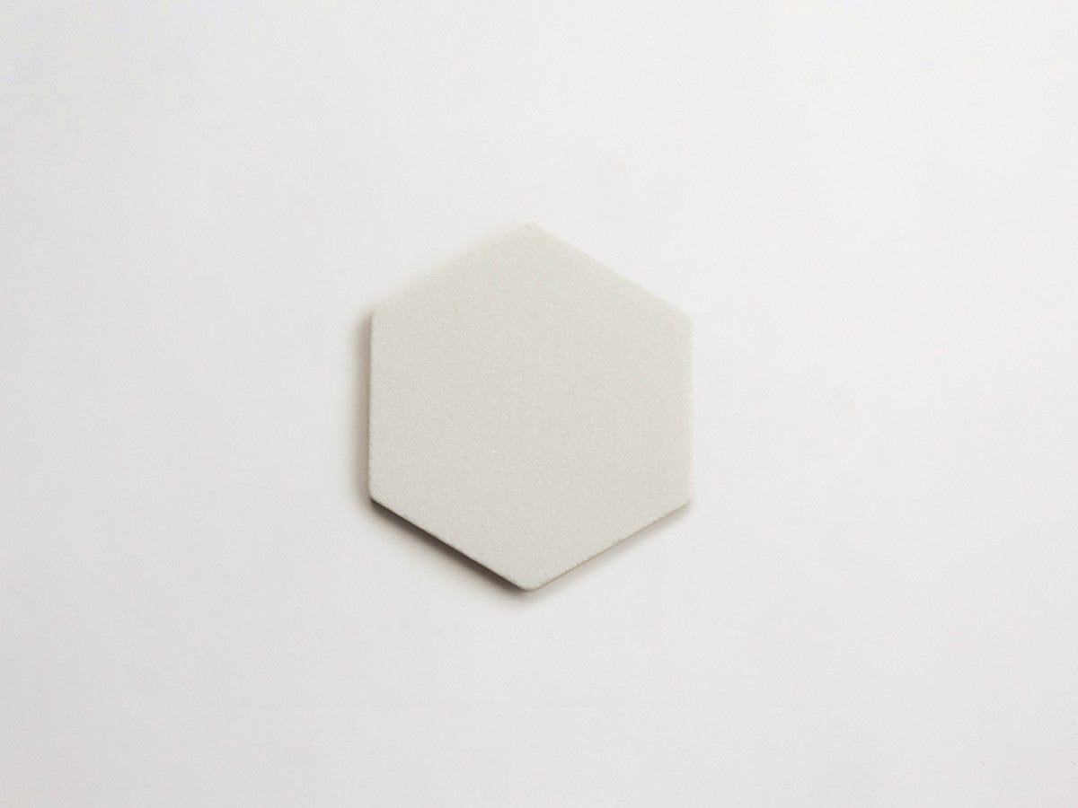 Lapidary stone tile 6¾ in. hex Thassos White Tumbled.