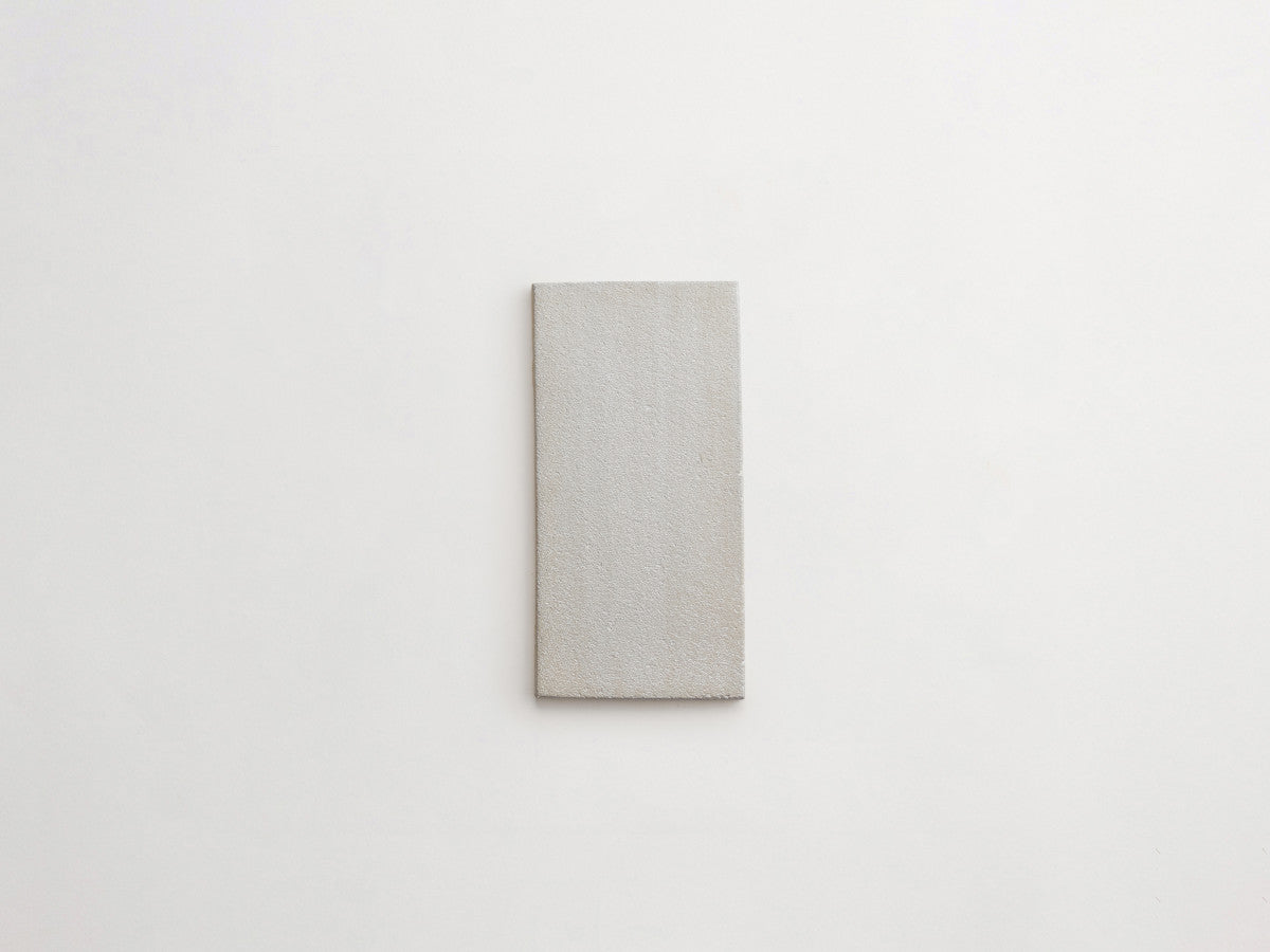 Ceramic Shibori Tile Natural 8x4 Grey Stain tile.
