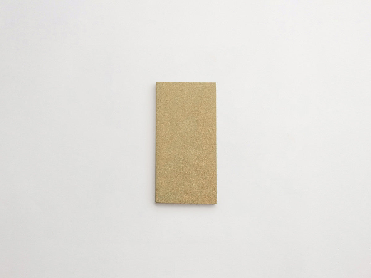 Ceramic Shibori Tile Natural 8x4 Yellow Wash tile.