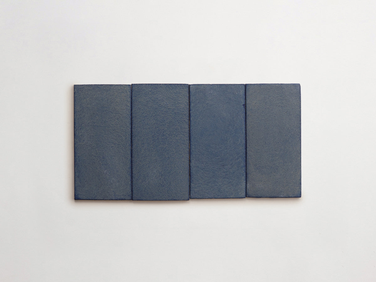 Ceramic Shibori Tile Natural 8x4 Indigo Stain tile.