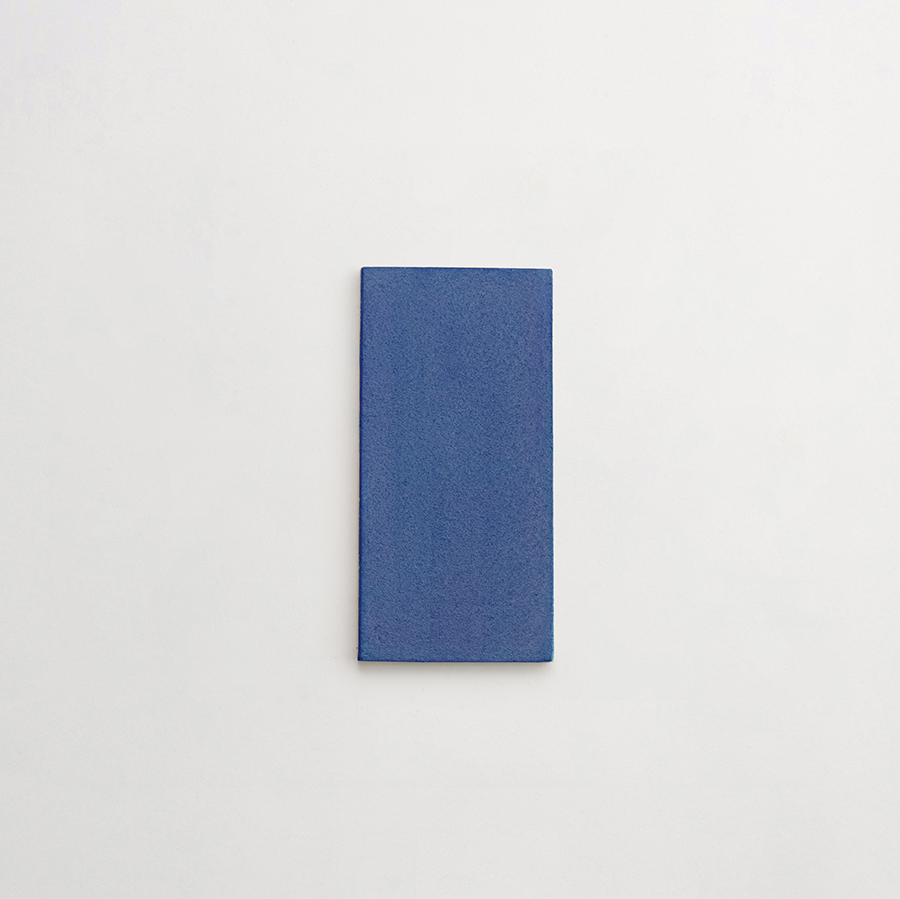 Ceramic Shibori Tile Natural 8x4 Indigo Stain tile.