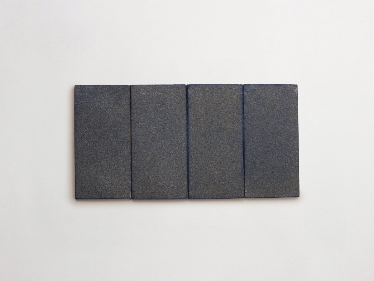 Ceramic Shibori Tile Grey 8x4 Indigo Stain tile.