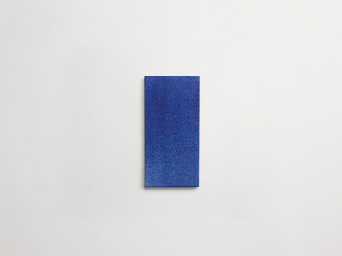 Ceramic Shibori Tile White 8x4 Indigo Stain tile.