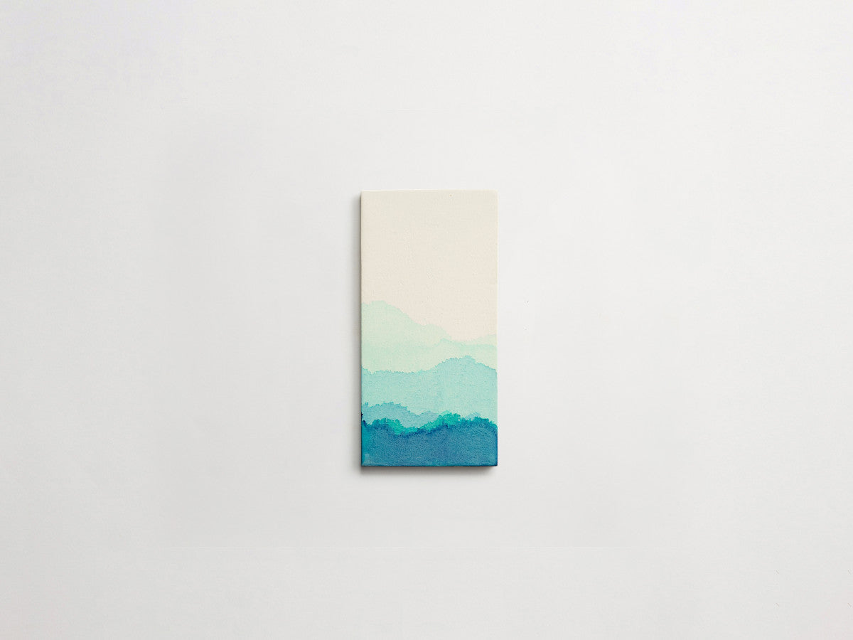 Ceramic Shibori Tile White 8x4 Teal Dip tile.