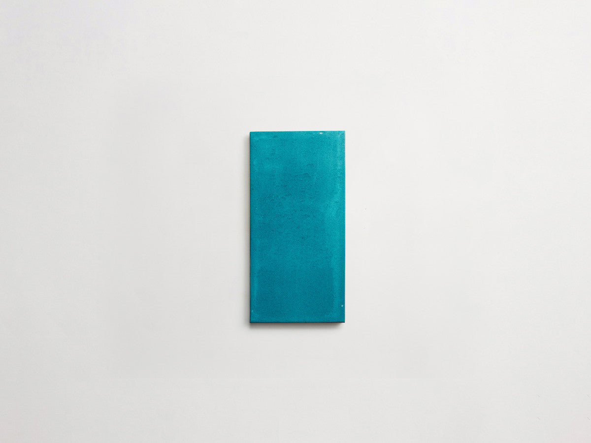 Ceramic Shibori Tile White 8x4 Teal Stain tile.