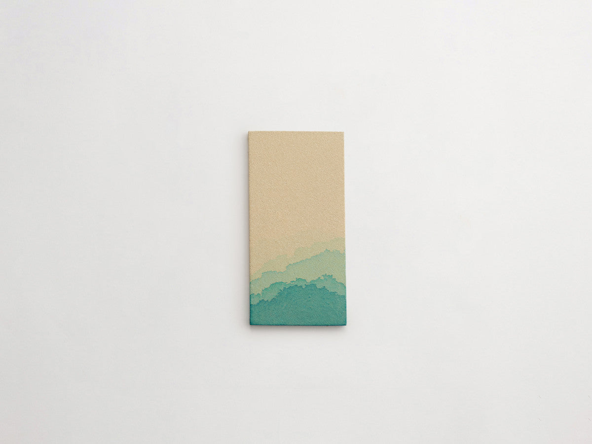Ceramic Shibori Tile Natural 8x4 Teal Dip tile.