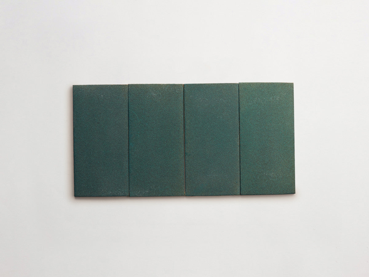 Ceramic Shibori Tile Grey 8x4 Teal Stain tile.