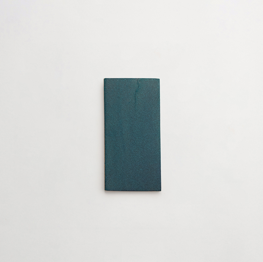 Ceramic Shibori Tile Grey 8x4 Teal Stain tile.