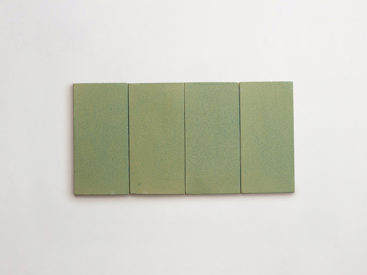 Ceramic Shibori Tile Natural 8x4 Teal Wash tile.