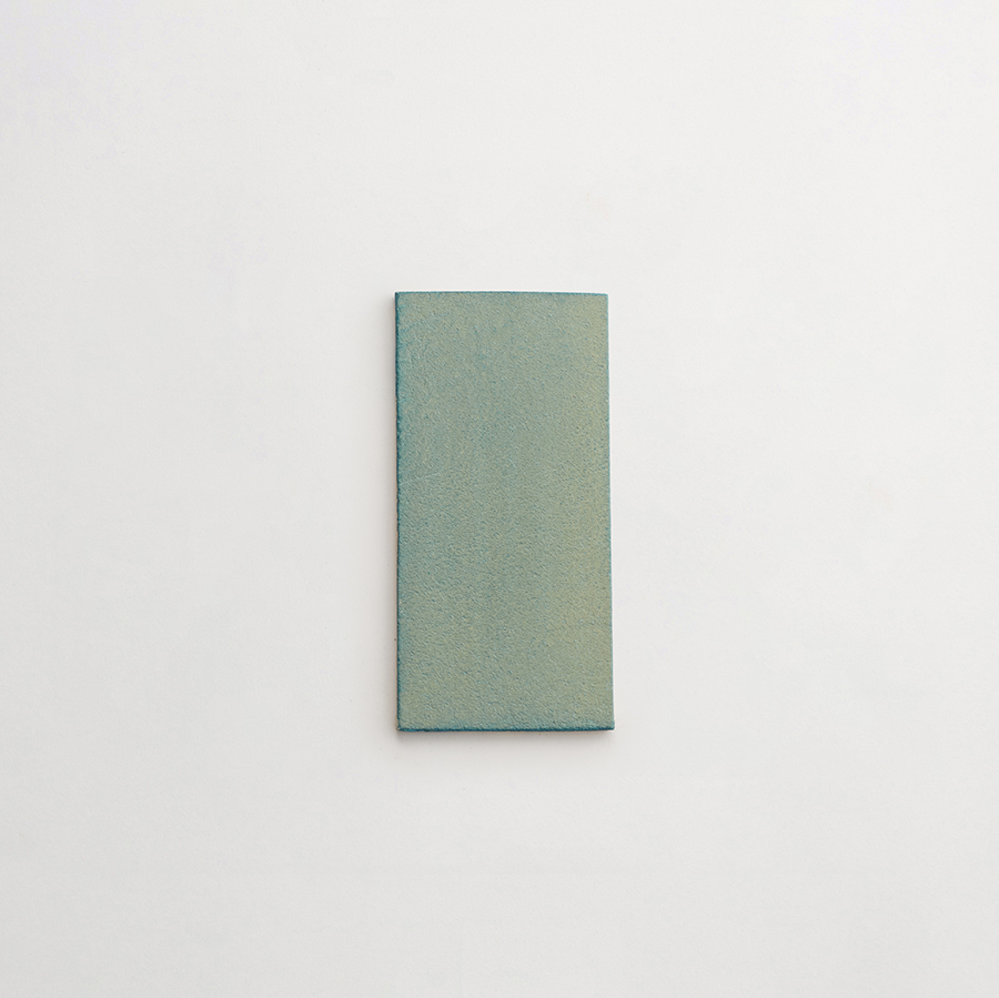Ceramic Shibori Tile Natural 8x4 Teal Wash tile.